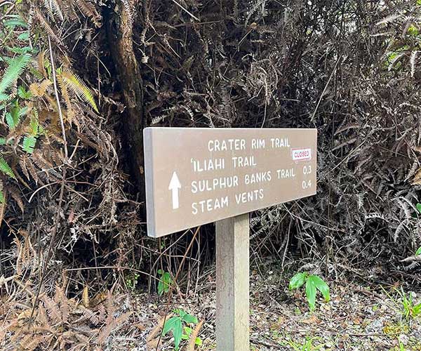 Trail sign in the National Park showing a closed trail