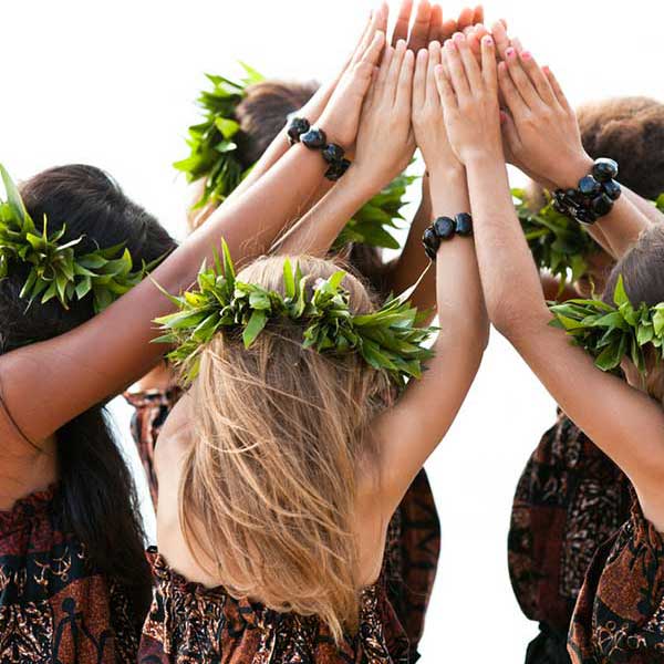 girls preforming a traditional hawaiian dance