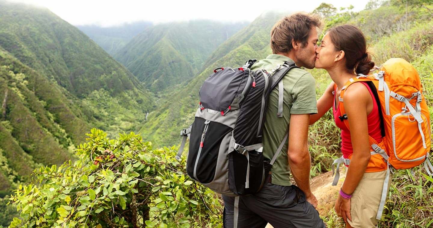 Couple kissing during hike on the big island of hawaii