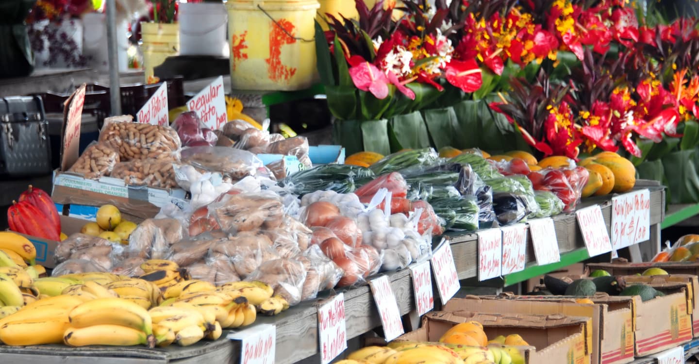 A table of hawaiian fruit at the Hilo Farmers Market