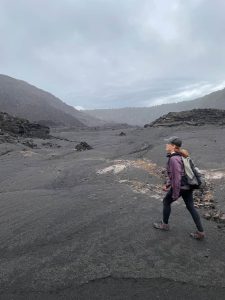 A woman walking through the Kīlauea Iki Crater at Hawaii Volcanoes National Park